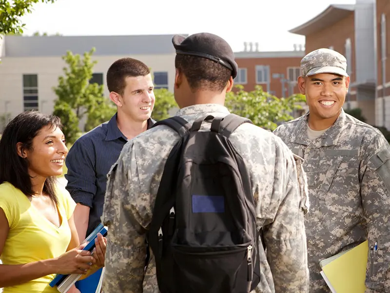 Image of student veterans talking in a group