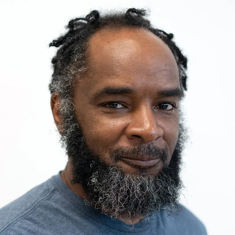 image of Wake Tech student Charles Myatt in a blue t-shirt
