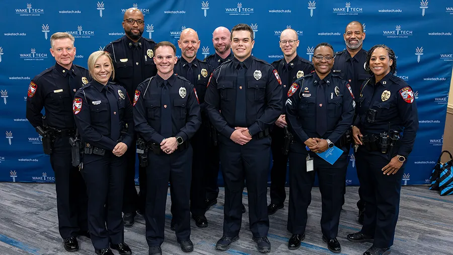 Cadets pose for a photo at the Basic Law Enforcement Training Academy graduation ceremony.