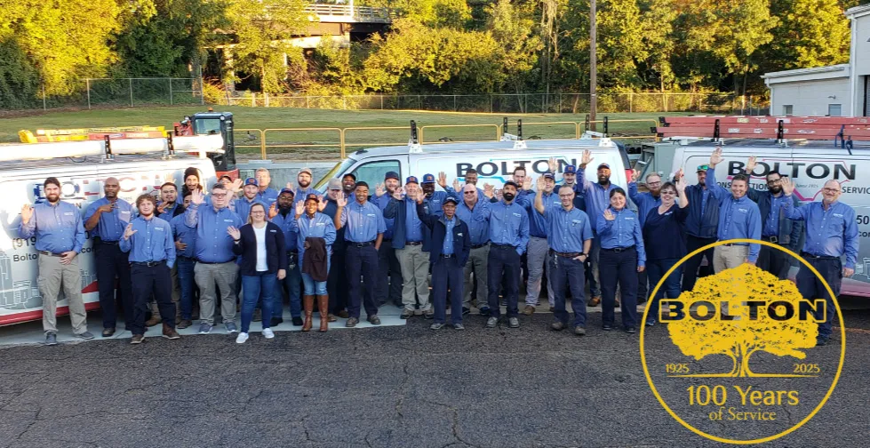  Bolton Construction and Service employees pose for a photo.