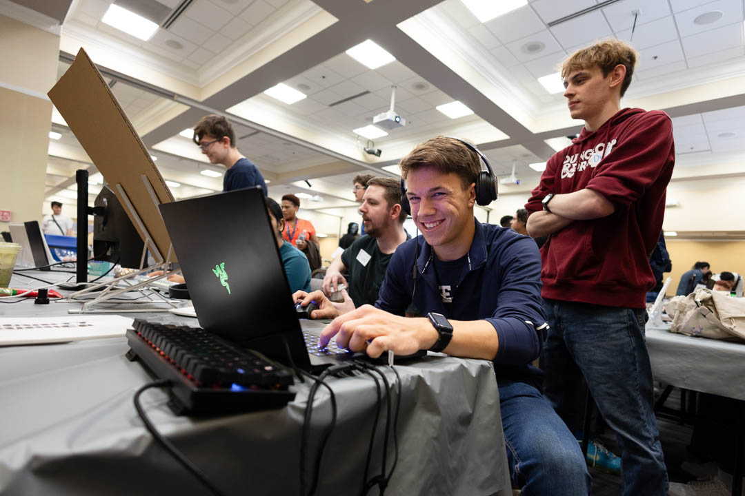 A Simulation and Game Development student shows off his skills at the Wake Tech Student Showcase.
