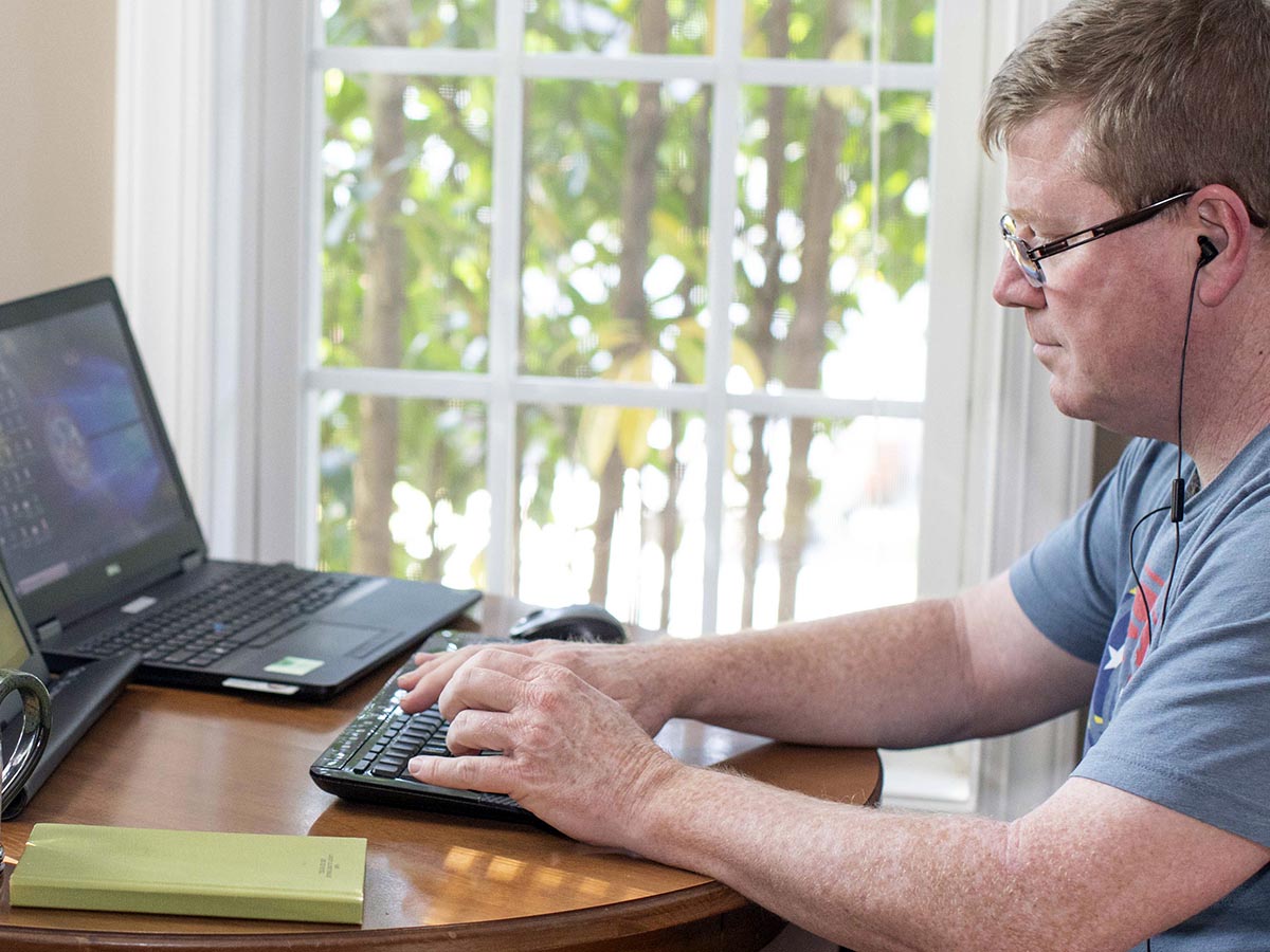 A man taking an online Wake Tech course