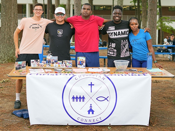 Members of Christian Connect pose at a Wake Tech club fair