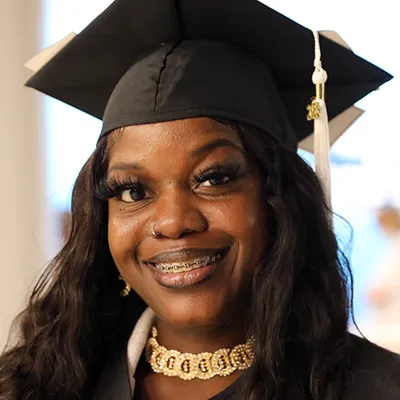 Adult High School graduate Marsofia Jean