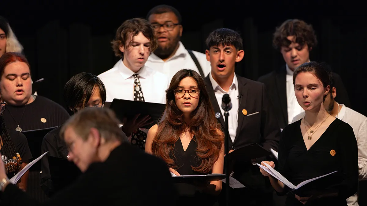 Members of a Wake Tech chorus sing during a concert.