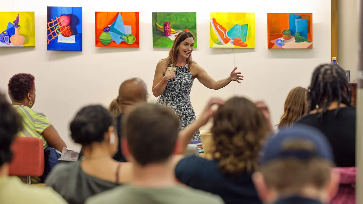 Associate Professor Dana Trent discusses her memoir in front of an audience at Wake Tech.