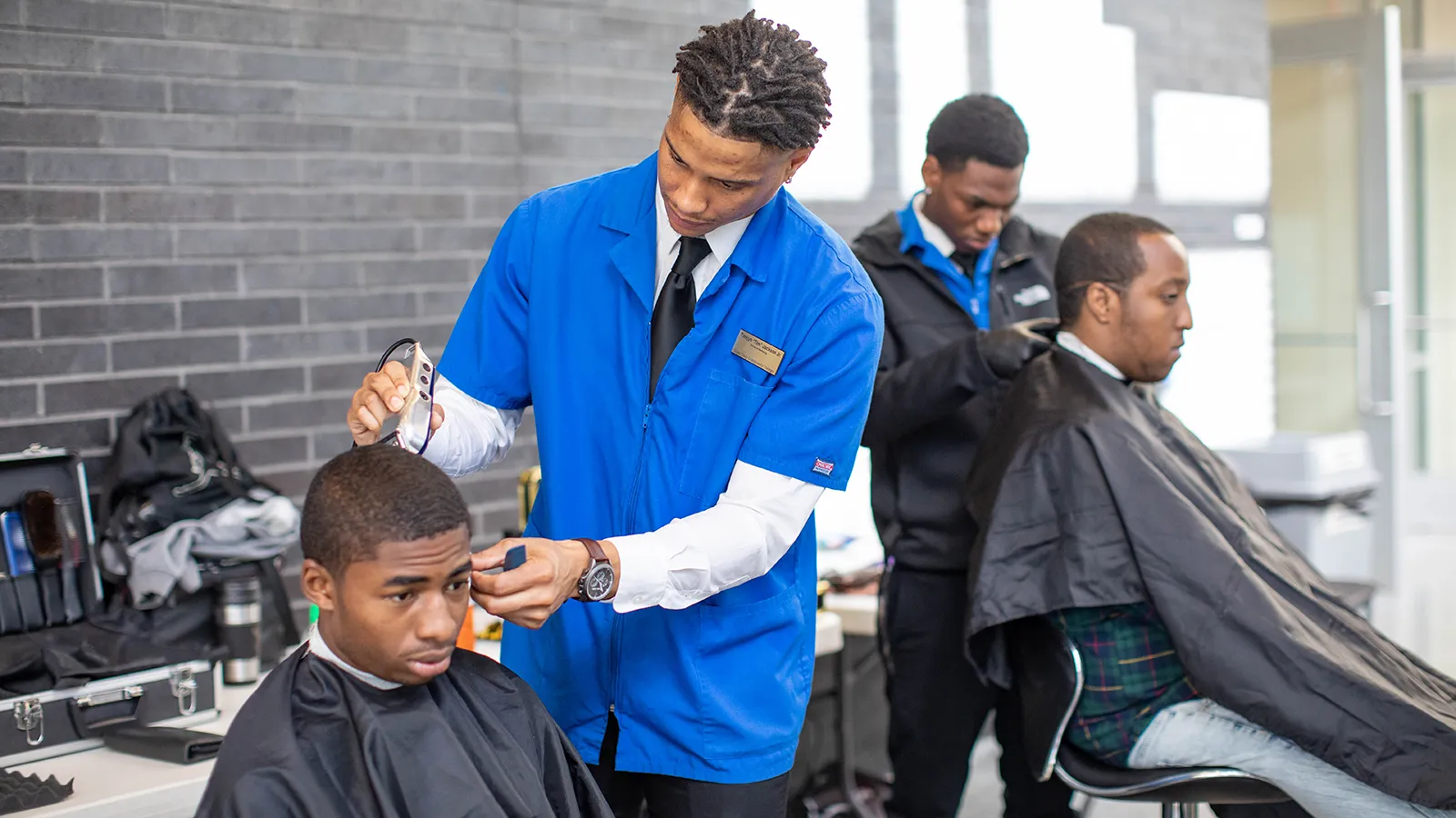 Wake Tech Barbering students provide haircuts on Scott Northern Wake Campus.