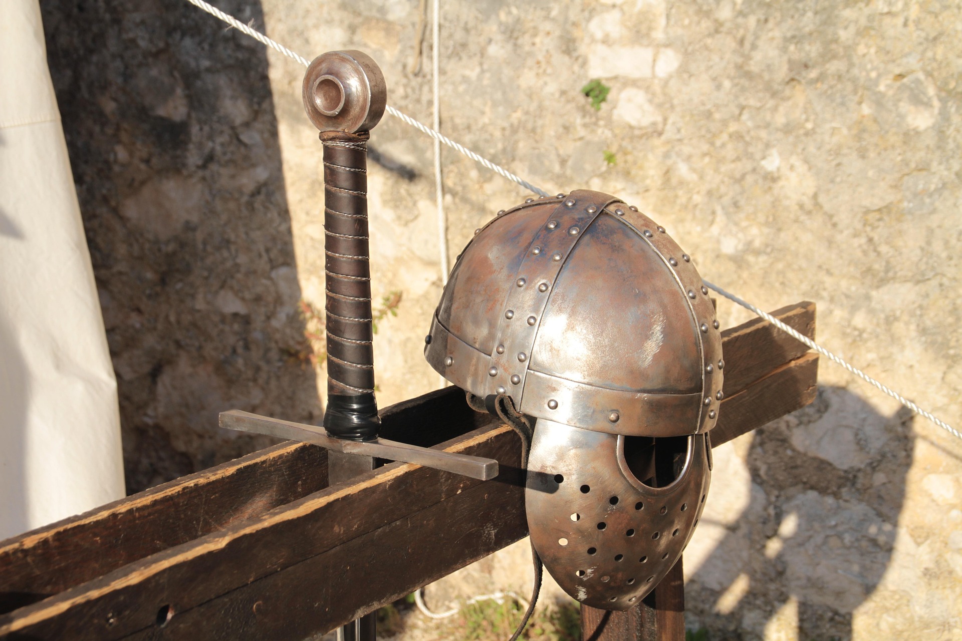 a medieval helmet and sword