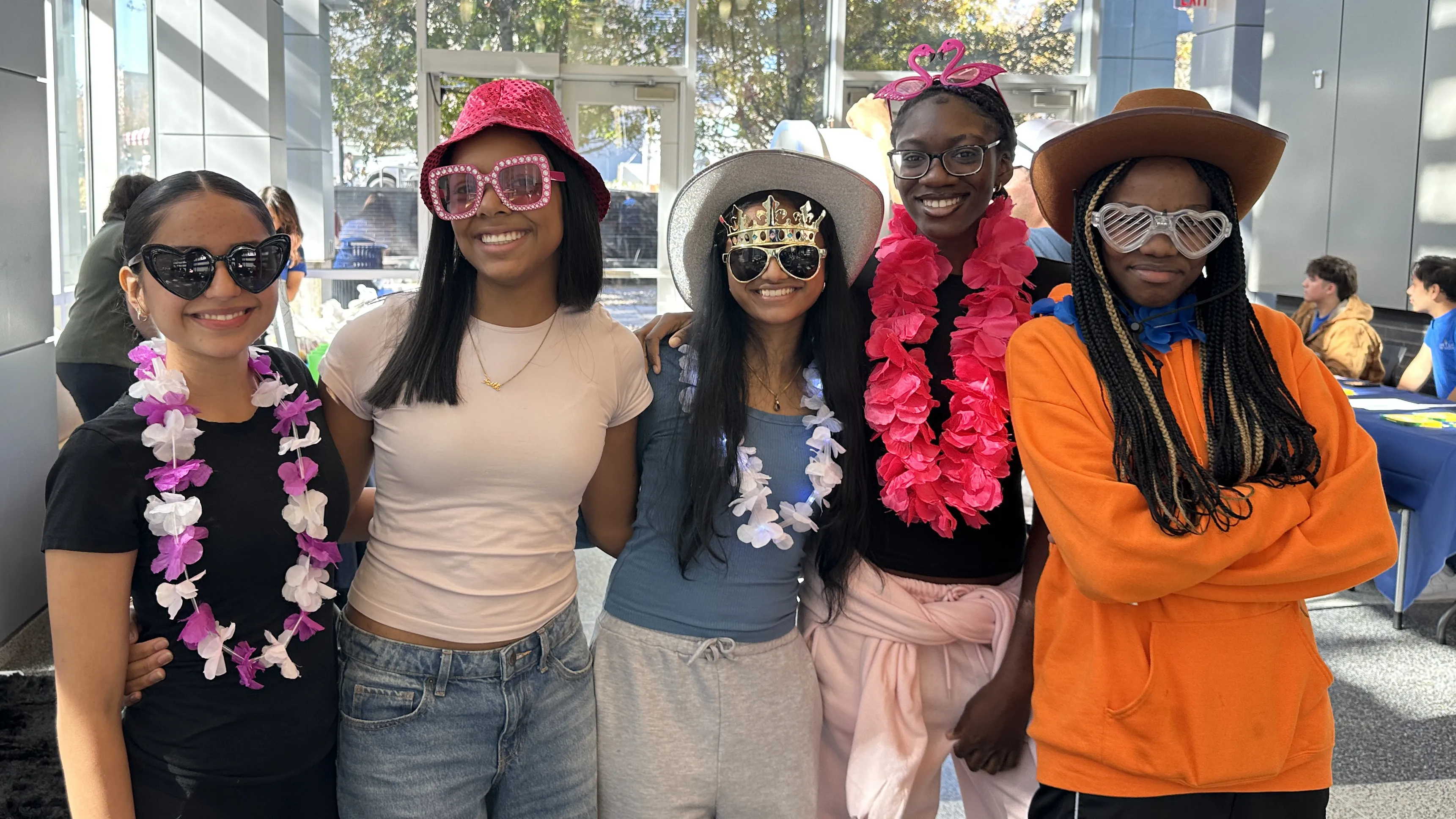 Five female students dressed in silly attire