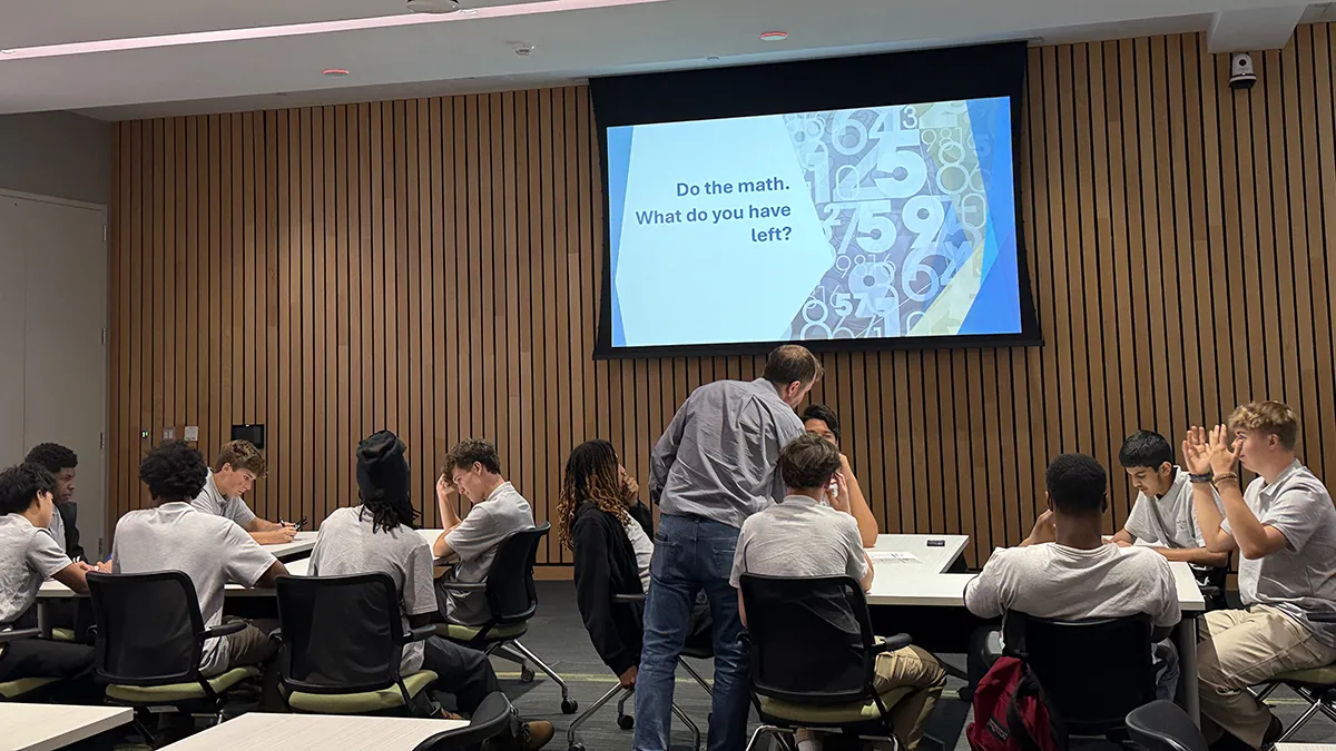 Students attend a Student Money Management class.