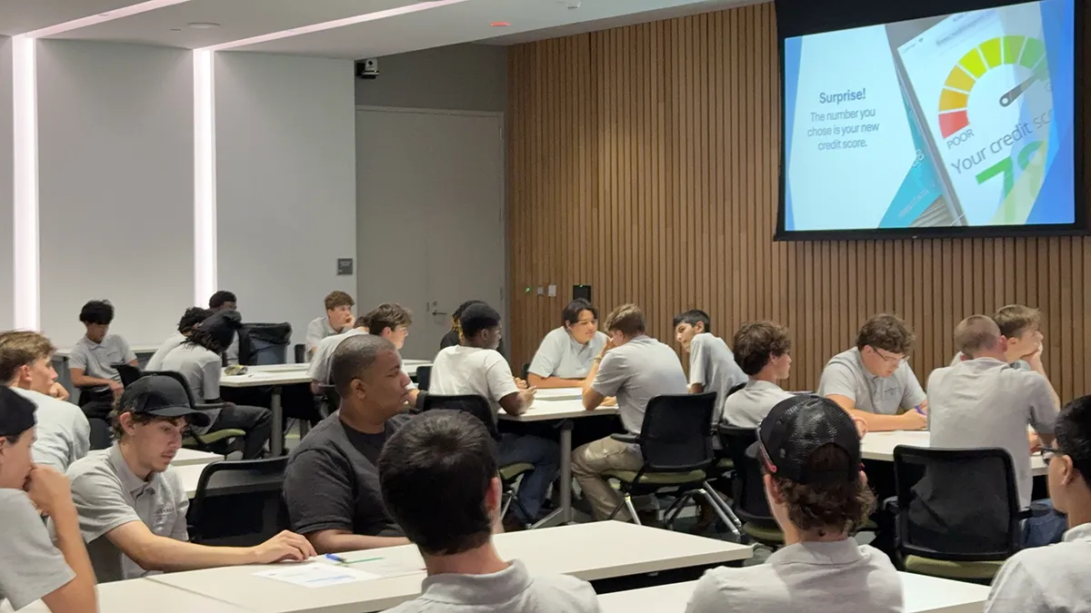 Students attend a Student Money Management class.
