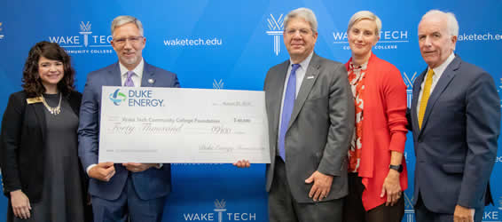 Wake Tech officials accept a major donation