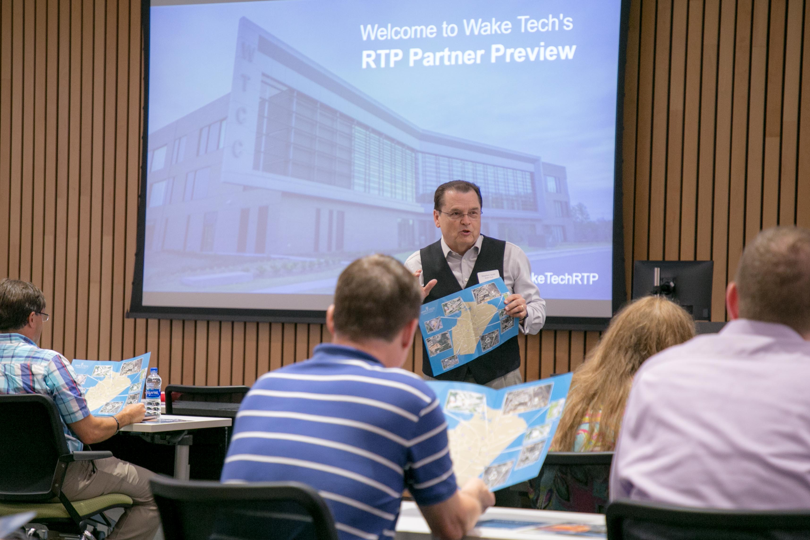 Wake Tech President Dr. Stephen Scott, Chief Campus Officer Dr. Rita Jerman and other Wake Tech staff and faculty in welcoming the group.