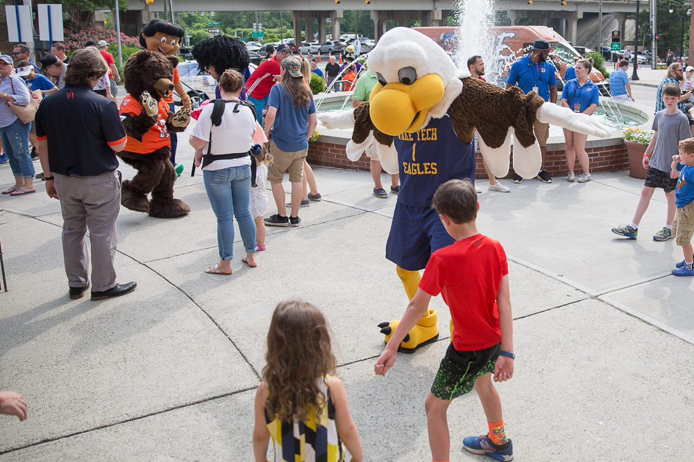 Talon learns new dance moves from young spectators.