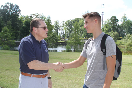 Dr Stephen C. Scott greets new students at the Northern Wake Campus