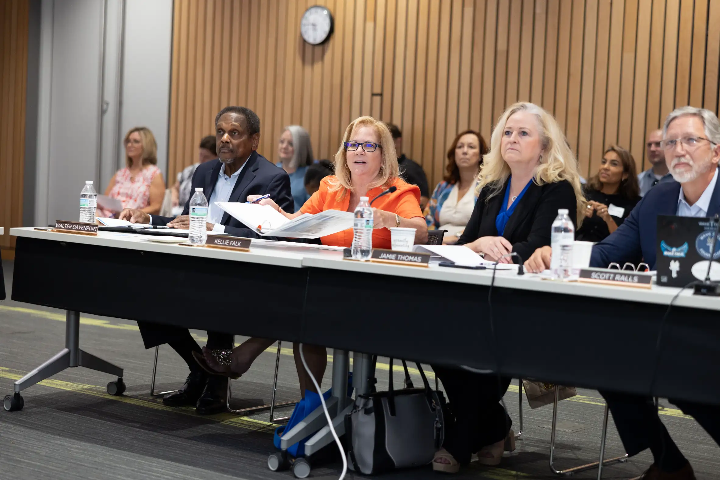 Wake Tech Board of Trustees discuss agenda.