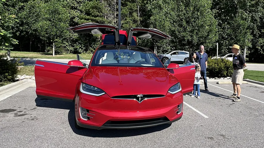 Electric vehicles are celebrated during a car show at the Hendrick Center for Automotive Excellence on Scott Northern Wake Campus.