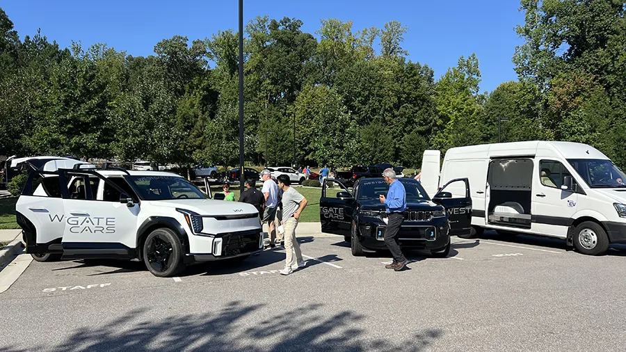 Electric vehicles are celebrated during a car show at the Hendrick Center for Automotive Excellence on Scott Northern Wake Campus.