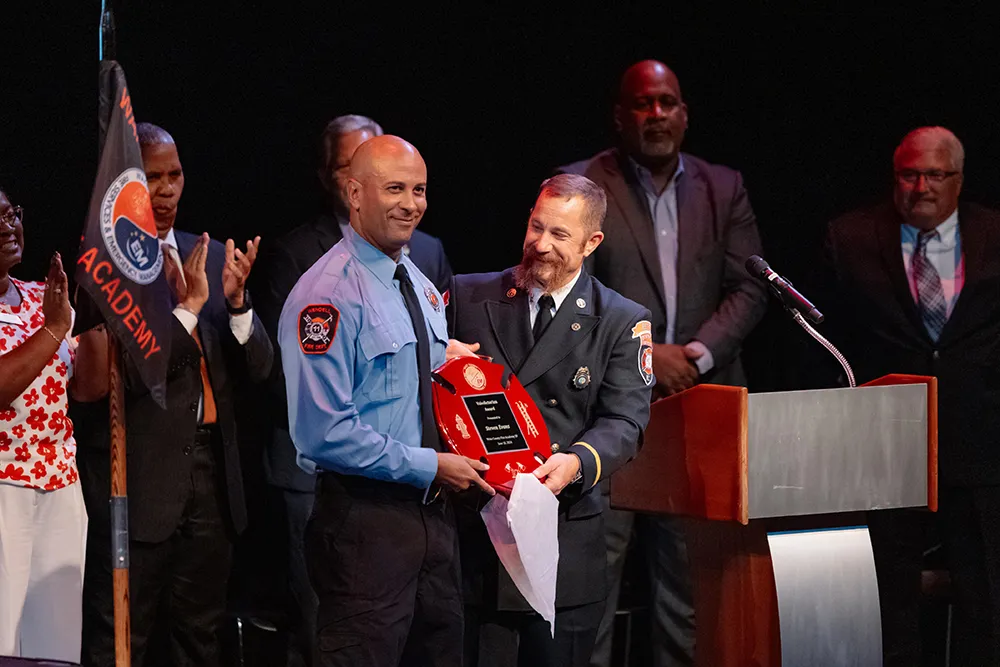 A cadet graduates from the Wake County Fire Academy.