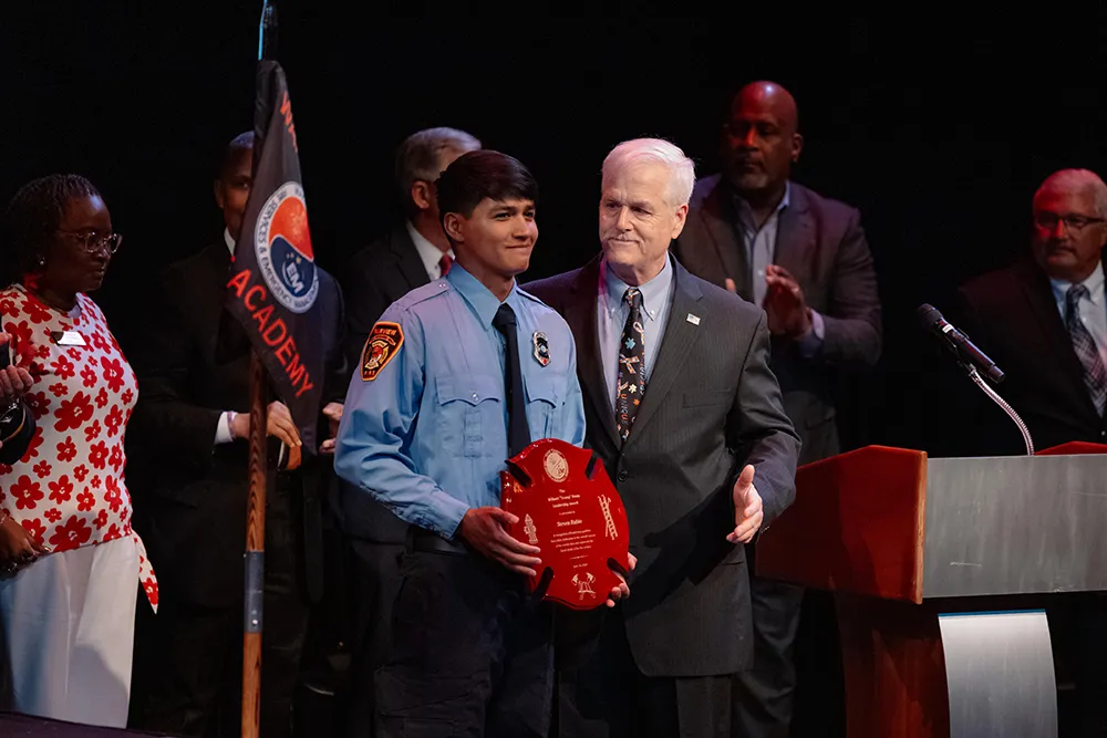 A cadet graduates from the Wake County Fire Academy.