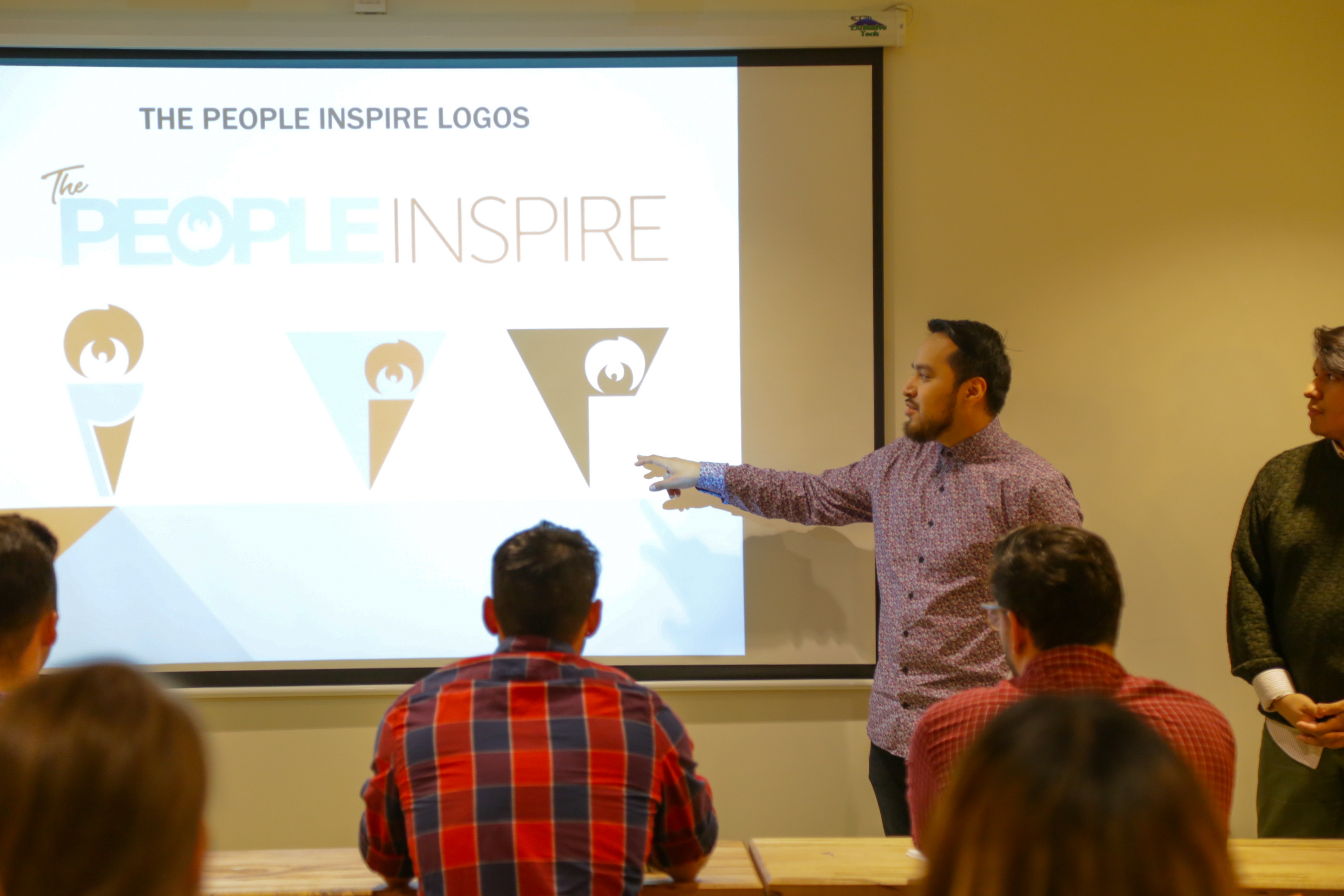 Graphic Design Students Pitch Branding Concepts to Real-Life Business Clients