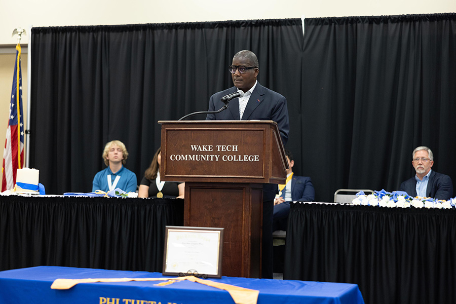 State Rep. James Roberson speaks at Wake Tech's Phi Theta Kappa induction ceremony.