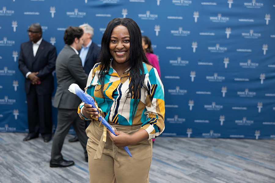 Each new Phi Theta Kappa member received a white rose.