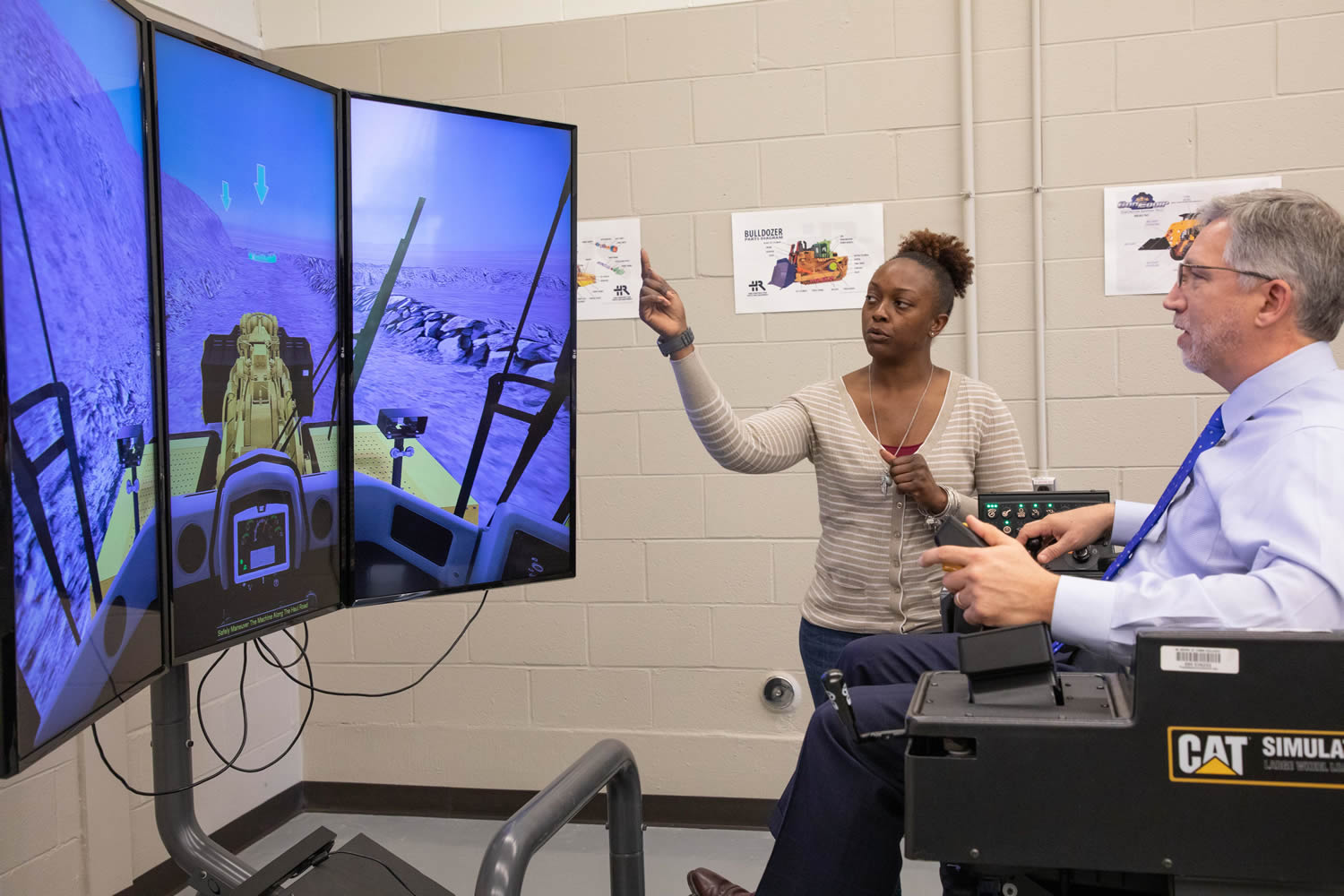 Dr. Ralls also observed the Heavy Equipment Operator simulation lab.