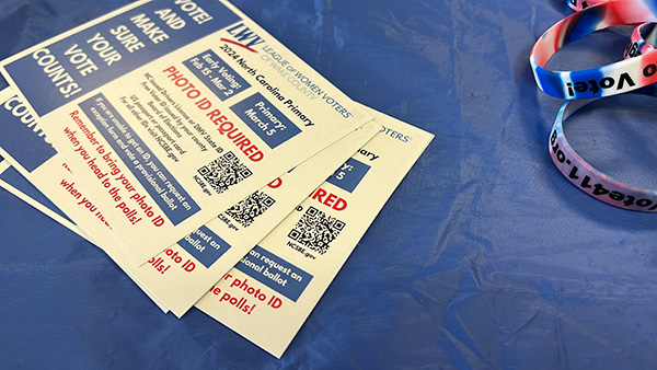 Fliers containing information about North Carolina's voter ID rules