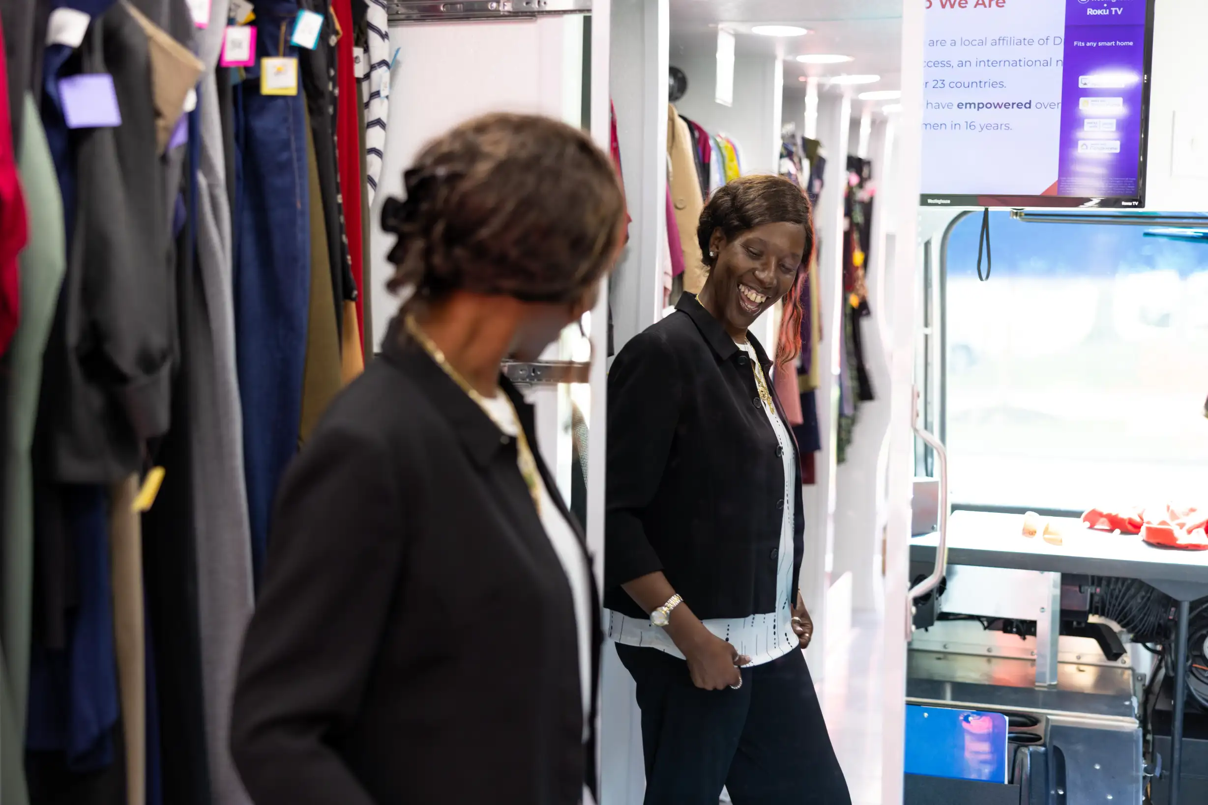 A woman checks out job-interview clothes provided by a nonprofit at Wake Tech's Job Fair.