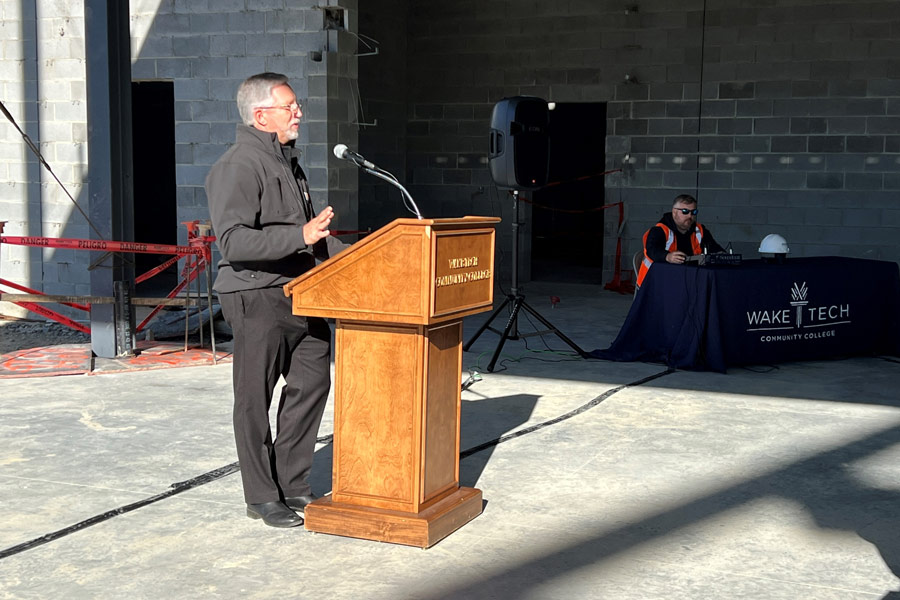 College Holds Topping-Out Ceremony for First Building at Future Campus