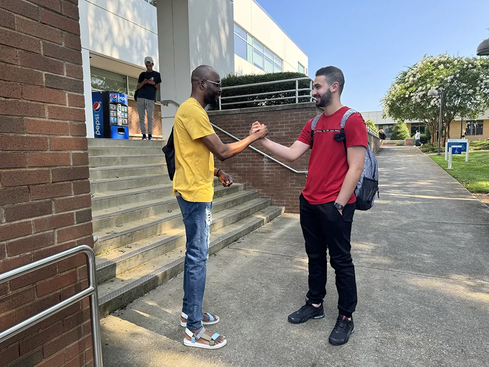 Two Wake Tech students celebrate the first day of the 2024-25 academic year.