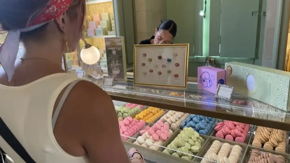 A Wake Tech student visits a patisserie in Paris during a 2024 Study Abroad trip.