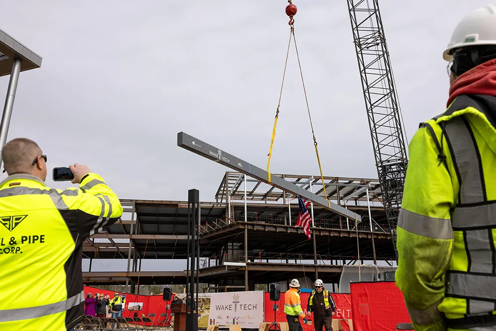 A topping out ceremony marked the construction progress on the Advanced Technology Center at Wake Tech East.