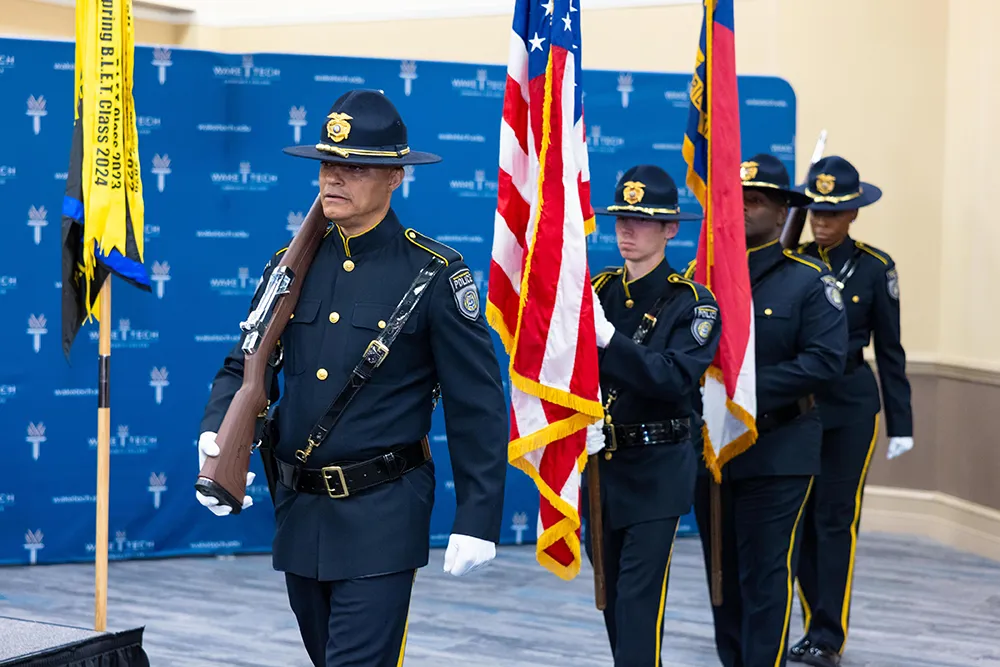 A color guard was part of the Wake Tech Basic Law Enforcement Training Academy graduation ceremony on May 20, 2025. (Court Johnson/Wake Tech)