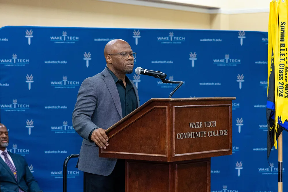 Anthony Caison, Wake Tech VP of Workforce Development, speaks during the Wake Tech Basic Law Enforcement Training Academy graduation on May 20, 2025. (Court Johnson/Wake Tech)
