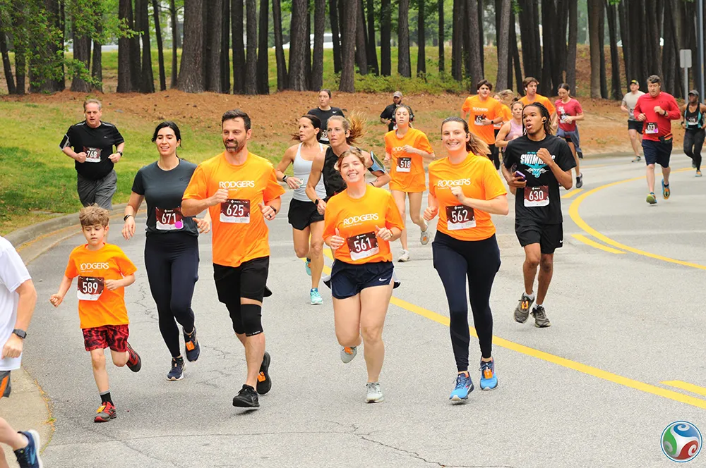 Participants race in the 2024 Fostering Footsteps event to support Wake Tech's Fostering Bright Futures program.