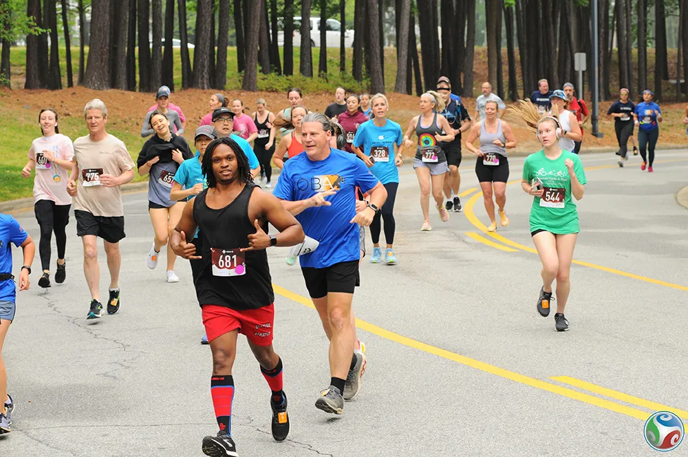 Participants race in the 2024 Fostering Footsteps event to support Wake Tech's Fostering Bright Futures program.