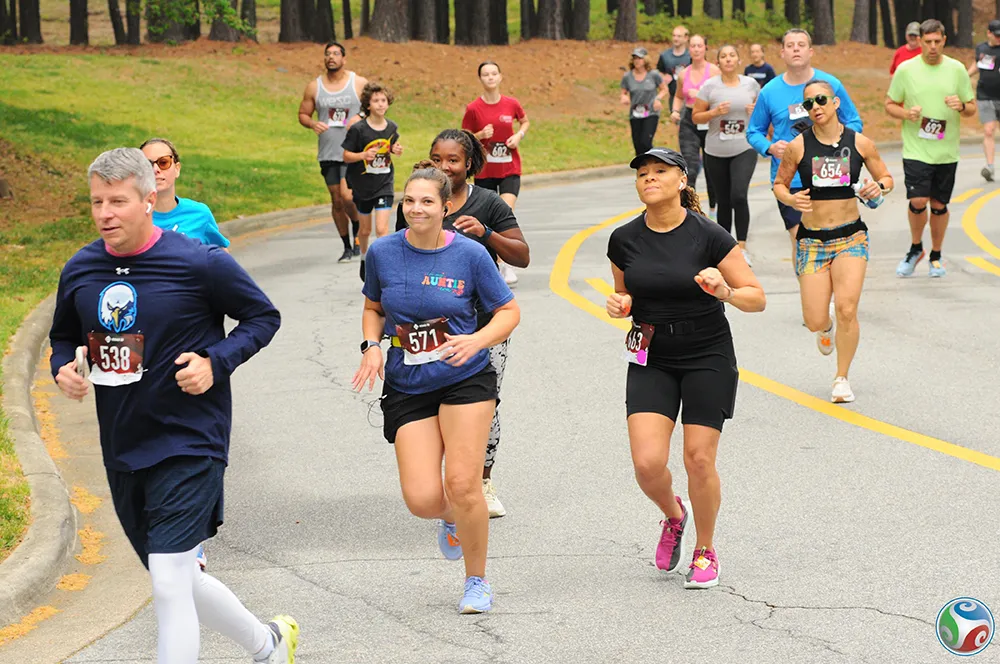 Participants race in the 2024 Fostering Footsteps event to support Wake Tech's Fostering Bright Futures program.