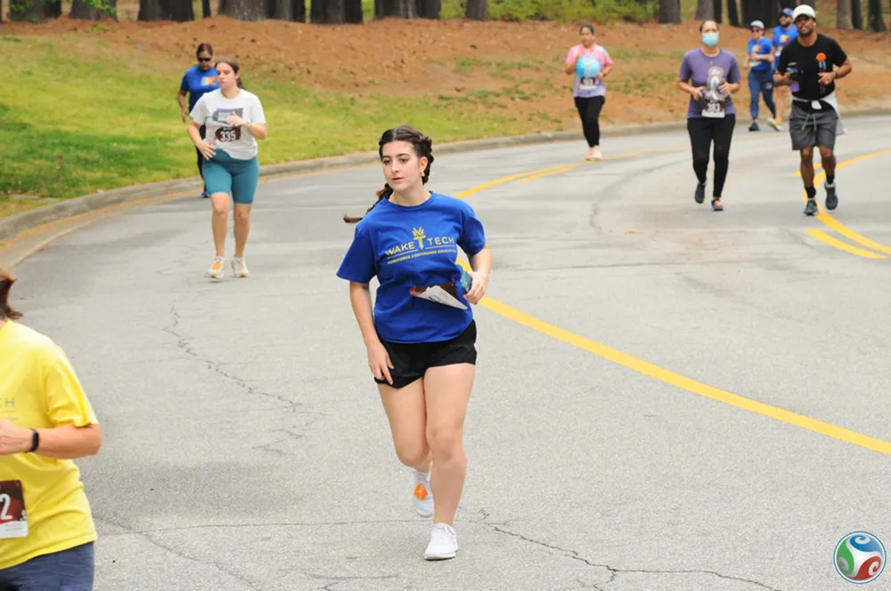 Participants race in the 2024 Fostering Footsteps event to support Wake Tech's Fostering Bright Futures program.