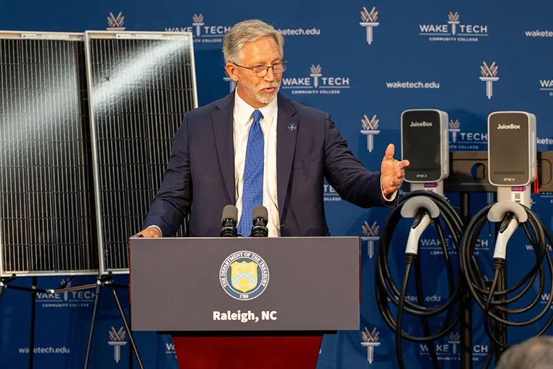 Wake Tech President Dr. Scott Ralls addresses dignitaries during U.S. Treasury Secretary Janet Yellen's visit to the college.
