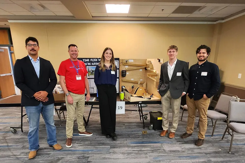 Over-Engineers won first place in the Rube Goldberg Machine Competition., 