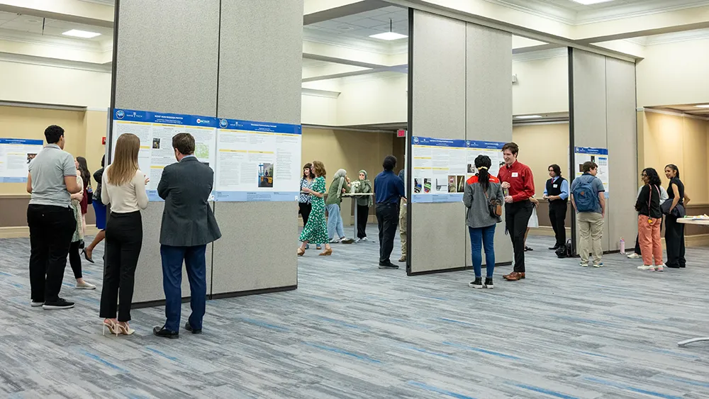 Students in the START program show off findings from a semester of scientific research.