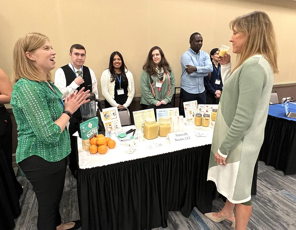 Business Administration students showcase projects designed to help area small businesses.