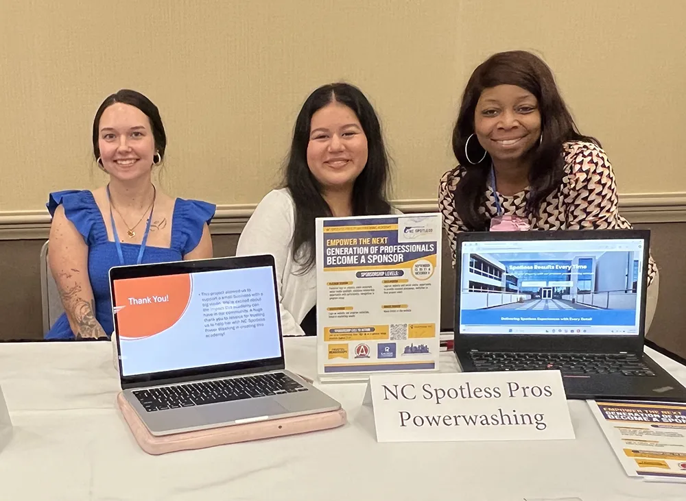 Business Administration students showcase projects designed to help area small businesses.