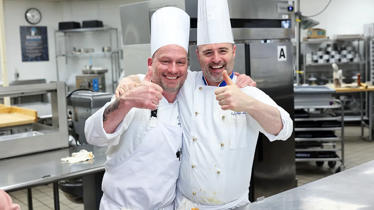 Chef Filippo Marini, right, created the menu for the "Ciao Down" fundraiser.