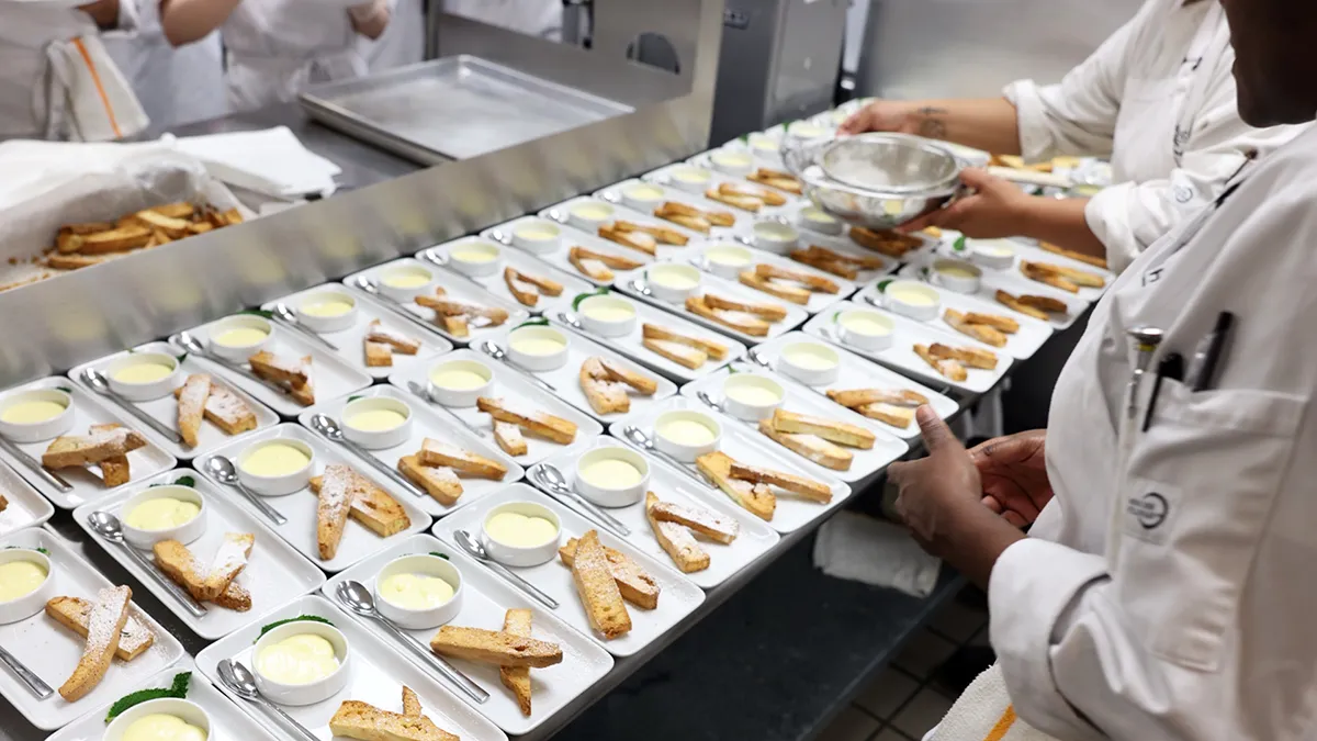 Culinary Arts students prepare a gourmet meal to raise funds for a Study Abroad trip to Italy.