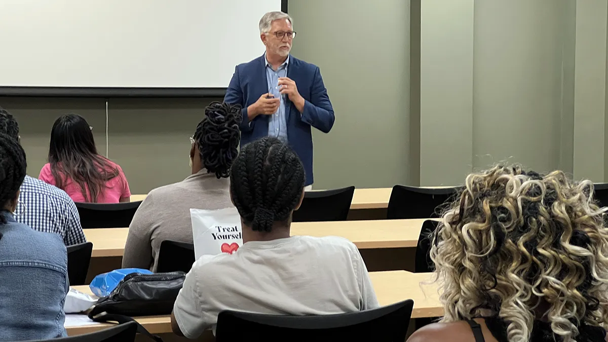 Wake Tech President Dr. Scott Ralls speaks to students at the closing ceremony for the Eagle Start Summer Bridge program.