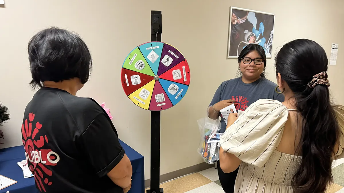 Wake Tech staff and students provide information about the college's programs and services to Spanish-speaking adults during the Open House en Español.