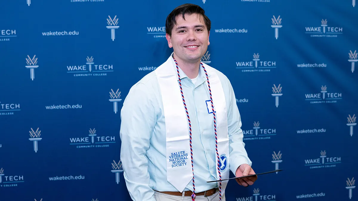Student veterans received honor cords that they can wear at graduation.